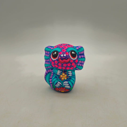 Alebrije Axolotl Figurine — TGH-6750; actual product against its original background.