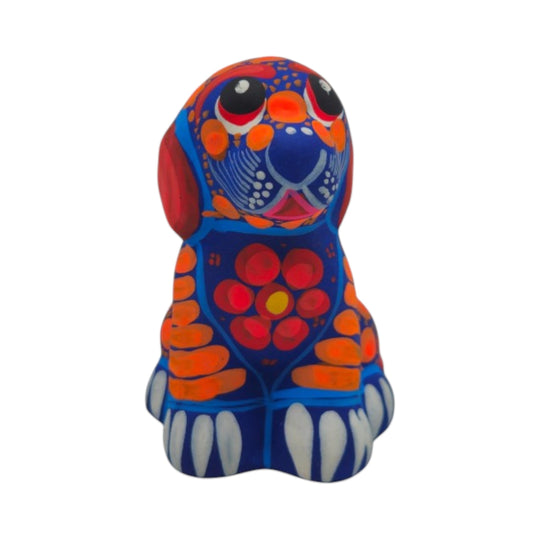Alebrije Dog Figurine | Hand-Painted Folk Art showcasing vibrant colors and intricate designs handcrafted in Mexico.