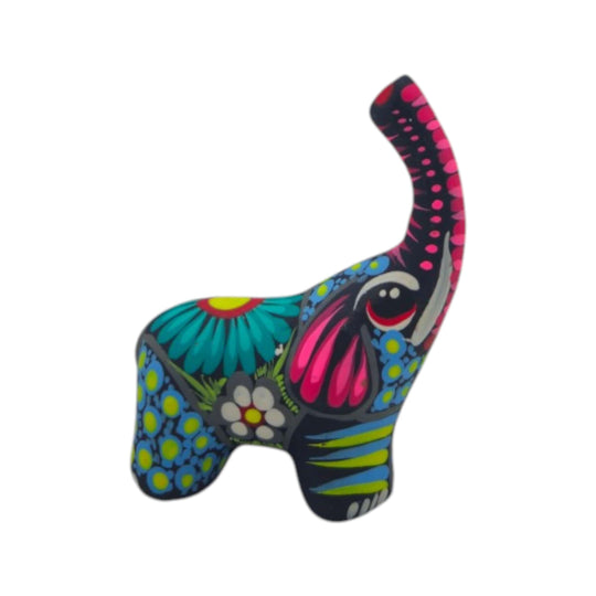 Front view of colorful ceramic Alebrije elephant figurine with floral folk-art details