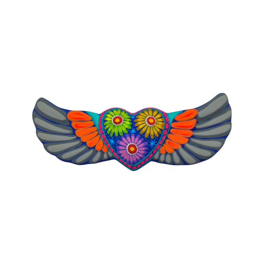 Ceramic Alebrije heart wall art with gray wings and bright floral painting