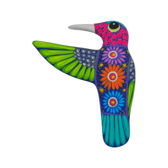 Front view of colorful ceramic Alebrije hummingbird wall art on a white background