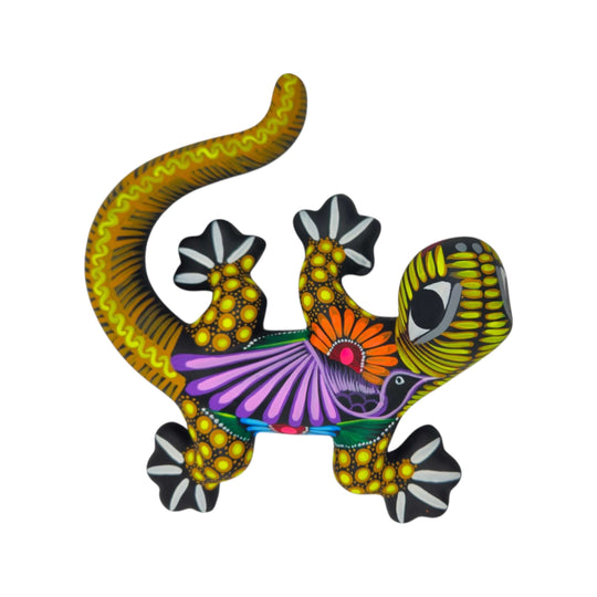 Top view of a hand-painted ceramic Alebrije lizard with bold floral patterns