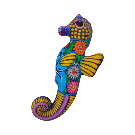 Alebrije Seahorse Figurine | Vibrant Ocean Wall Art, vibrant hand-painted ceramic seahorse with colorful floral details.