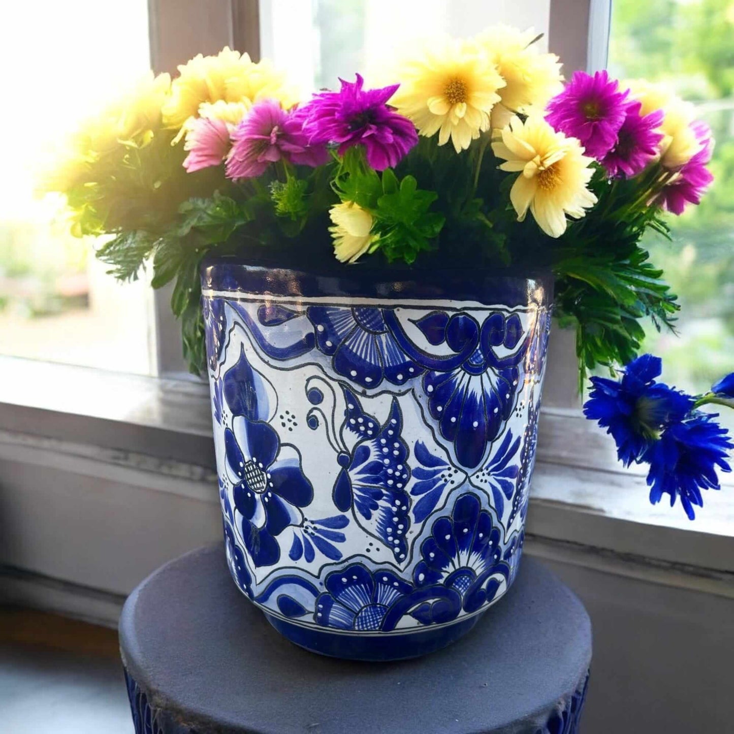 Artisan Talavera Planter | Blue & White Mexican Flower Pot with hand-painted blue floral patterns and colorful daisies, kiln-fired lead-free glaze