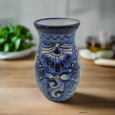 Blue Floral Talavera Vase | Hand-Painted Mexican Pottery on wooden table, deep cobalt blue and white floral motifs, handcrafted in Guanajuato