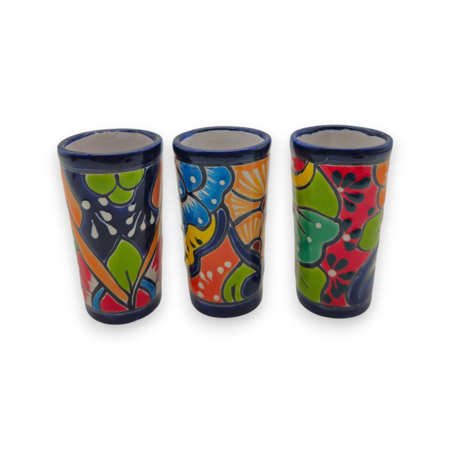 Blue Rim Talavera Shot Glass | Hand-Painted Mexican Drinkware - trio of tall hand-painted floral shot glasses with bold blue rims