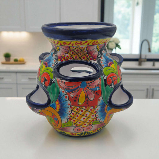 Blue Rim Talavera Strawberry Pot | Hand-Painted Mexican Planter on kitchen counter, vibrant hand-painted floral design with deep blue rim