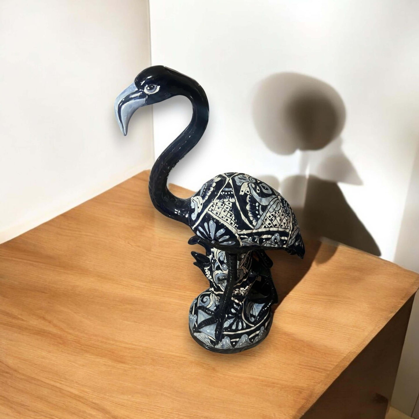 Blue & White Talavera Flamingo Statue | Hand-Painted Bird Pottery - handcrafted blue and white Talavera flamingo on wood surface
