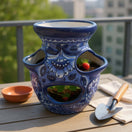 Blue & White Talavera Strawberry Planter | Handmade Mexican Pot on a patio.