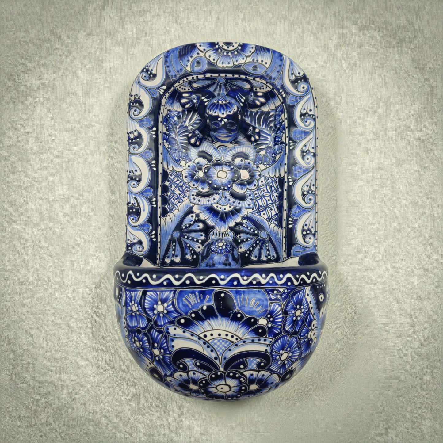 Blue & White Talavera Wall Fountain | Handcrafted Mexican Ceramic handcrafted blue and white Talavera wall fountain with lion-head spout and floral motifs