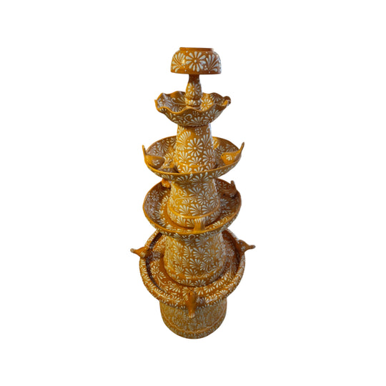 Brown and white tiered Talavera fountain shown against a white background