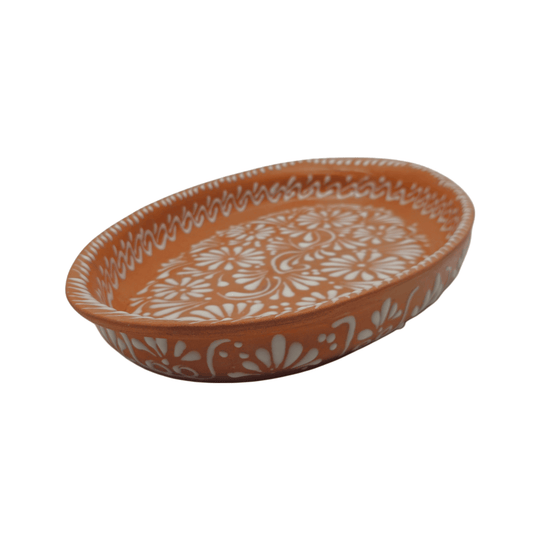 Brown and white Talavera oval serving platter shown from a low angled view