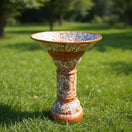 Brown & White Talavera Bird Bath | Handmade Garden Accent on grass