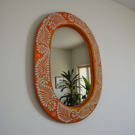 Floral Brown & White Talavera Mirror | Handcrafted Mexican Art - oval hand-painted Talavera mirror with white floral motifs on warm brown frame