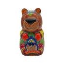 Front view of brown capybara Talavera animal planter with colorful floral patterns
