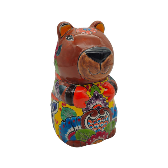 Side view of brown capybara Talavera planter with multicolor hand-painted folk-art designs