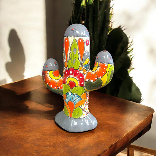 Colorful Talavera Cactus Sculpture | Mexican Ceramic Decor hand-painted Talavera cactus sculpture with bright floral motifs on wooden table
