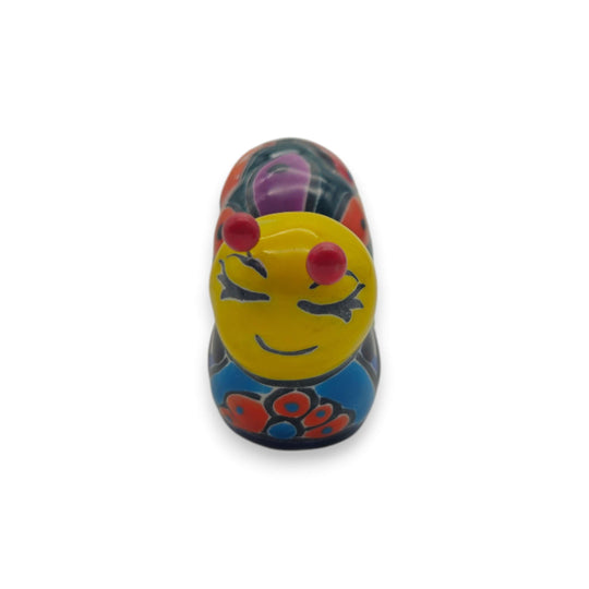 Colorful Talavera Caterpillar | Mexican Ceramic Figurine hand-painted glossy folk-art caterpillar with bright blue, yellow, red and green patterns