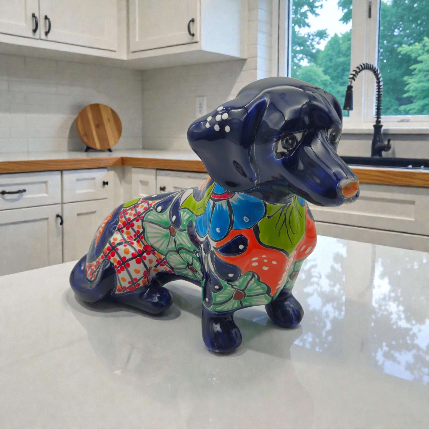 Colorful Talavera Dachshund | Mexican Ceramic Dog Figurine handcrafted vivid floral dachshund figurine on kitchen countertop