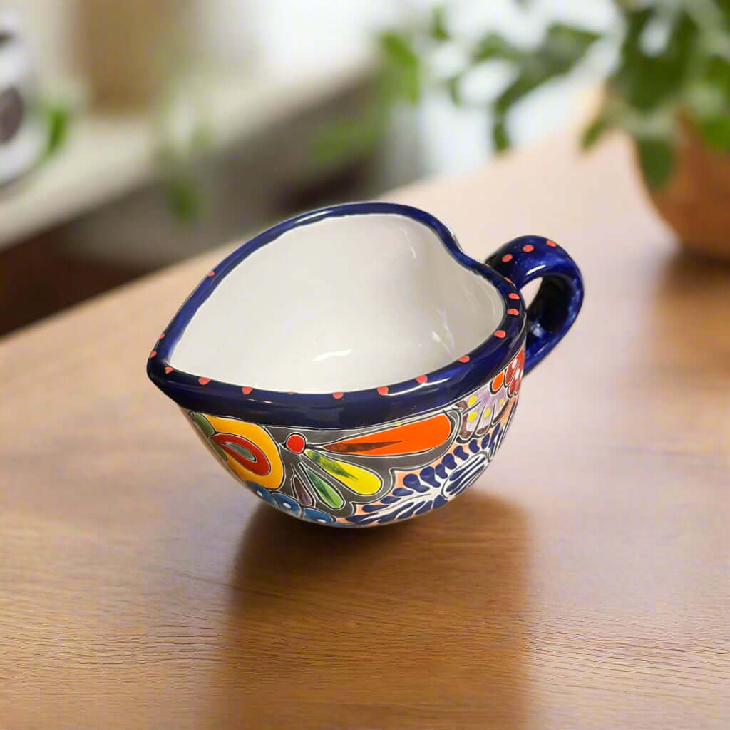 Colorful Talavera Heart Mug | Handmade Mexican Pottery Cup hand-painted heart-shaped ceramic mug with cobalt rim and bright Talavera floral design