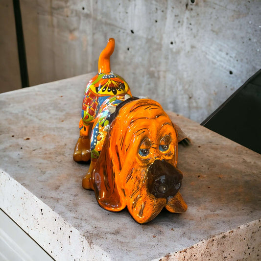 Colorful Talavera Hound Dog Statue | Handcrafted Mexican Dog Art (Medium Size) glazed hand-painted orange ceramic basset hound on stone table