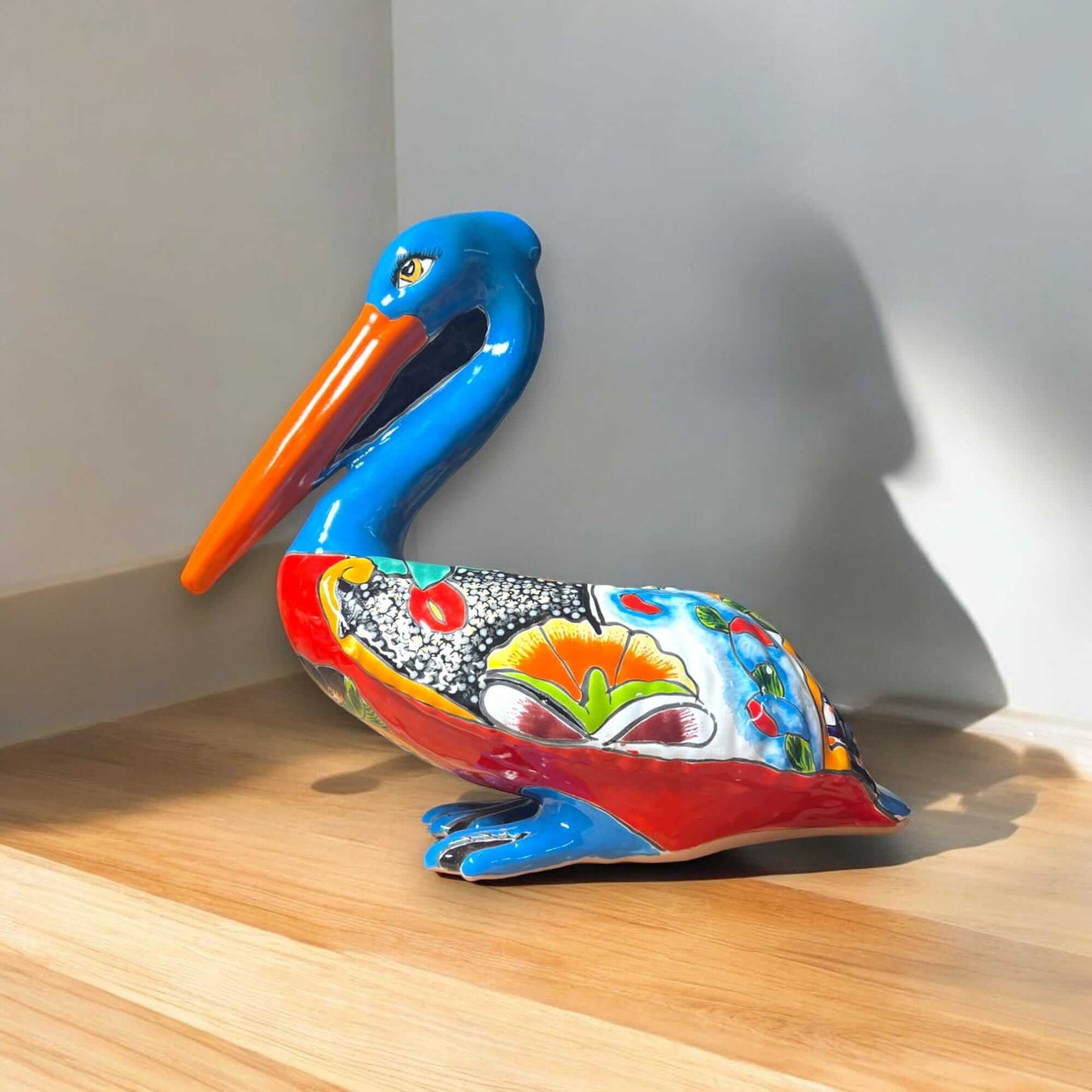 Colorful Talavera Pelican Planter | Handmade Mexican Bird Pottery - hand-painted Talavera pelican planter showcasing vibrant floral patterns