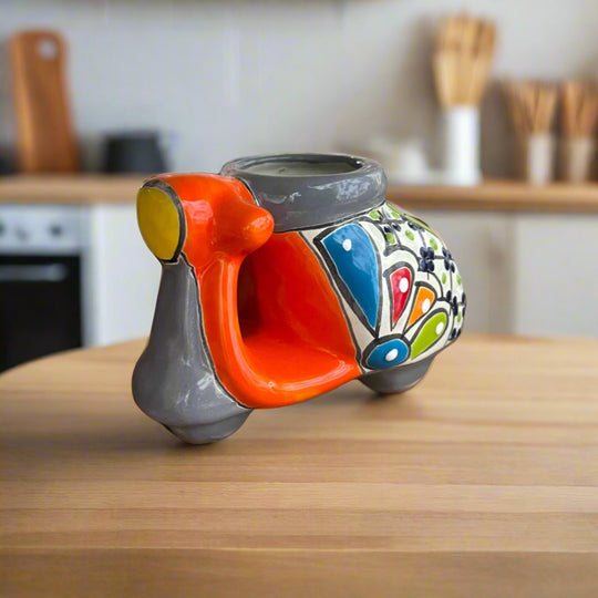 Colorful Talavera Scooter Planter | Mexican Art Decor hand-painted Talavera scooter planter with vibrant orange, blue and floral patterns