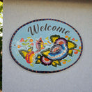 Colorful Talavera Welcome Plaque | Hand-Painted Wall Sign - Oval hand-painted Talavera ceramic foyer sign with bright floral motif and lead-free glaze