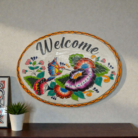 Colorful Talavera Welcome Plaque | Hand-Painted Wall Sign — oval hand-painted Talavera ceramic welcome plaque with vibrant floral and bird motif