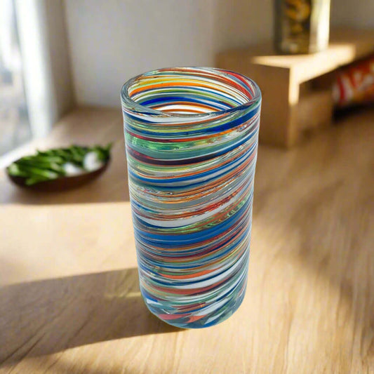 Colorful Hand-Blown Tumbler | Confetti Swirl Mexican Glass - tall hand-blown glass tumbler with red, blue, green, orange and yellow confetti swirl pattern