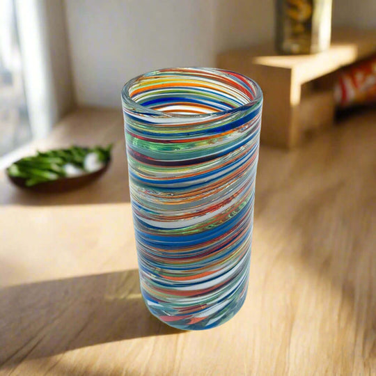 Colorful Hand-Blown Tumbler | Confetti Swirl Mexican Glass - tall hand-blown glass tumbler with red, blue, green, orange and yellow confetti swirl pattern