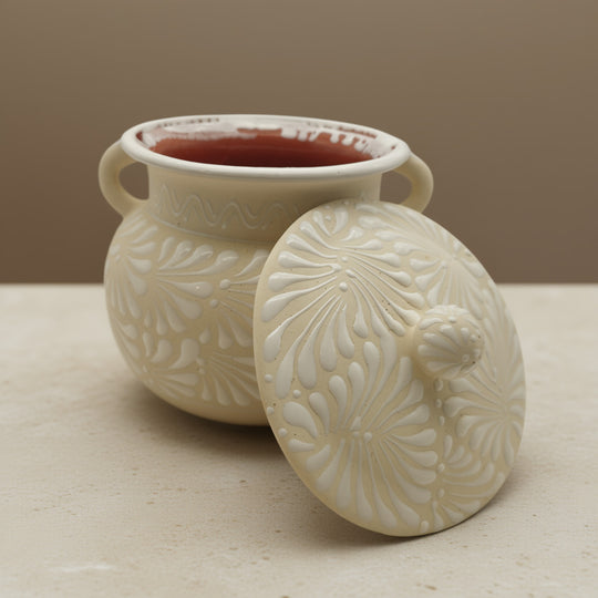 Cream Talavera Bean Pot with Lid | Handcrafted Mexican Clay – handcrafted creamy white Talavera bean pot with embossed floral motifs and matching lid