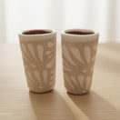 Cream Talavera Shot Glass | Handcrafted Mexican Ceramic - pair of cream-toned hand-painted Talavera shot glasses with white floral relief from Guanajuato