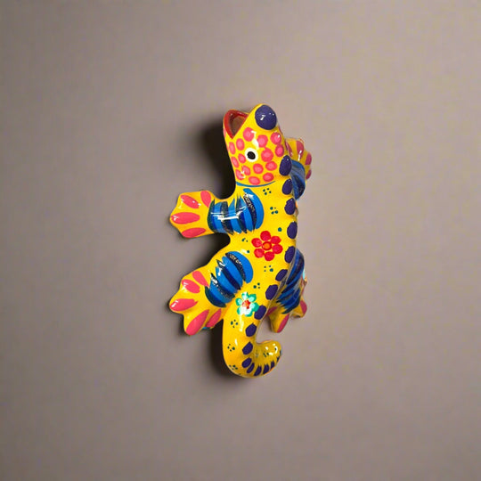 Guerrero Iguana Figurine | Colorful Hand-Painted Mexican Folk Art - yellow hand-painted Talavera-style iguana with purple, blue and red floral dots