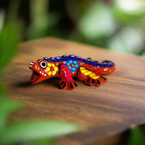 Guerrero Iguana Figurine | Colorful Hand-Painted Mexican Folk Art - hand-painted Talavera iguana with vibrant purples reds blues and floral dots