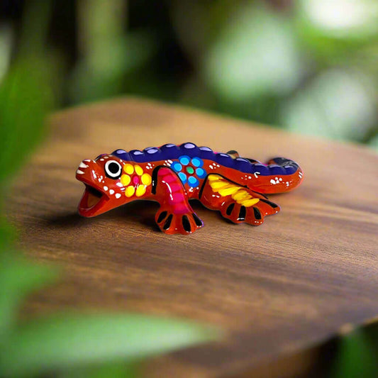Guerrero Iguana Figurine | Colorful Hand-Painted Mexican Folk Art - hand-painted Talavera iguana with vibrant purples reds blues and floral dots