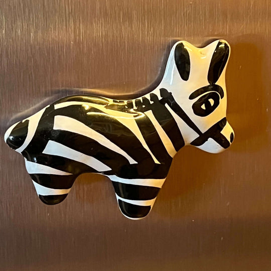 Guerrero Pottery Magnets | Assorted Mexican Fridge Magnets - black and white hand-painted zebra ceramic magnet on stainless steel refrigerator