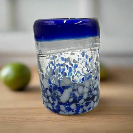 Hand Blown Mexican Shot Glass | Blue and White Artisan Tequila Shooter - hand-blown lead-free glass with blue swirl and speckled base