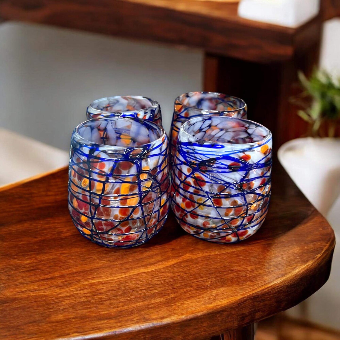 Mexican Stemless Wine Glass | Hand-Blown Orange & Blue Swirl - set of 4 recycled glass tumblers with vibrant orange and cobalt swirl pattern
