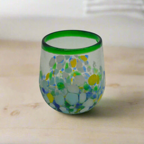 Hand-Blown Stemless Wine Glass | Mexican Confetti with Green Rim - hand-blown lead-free glass with green rim and blue yellow confetti pattern