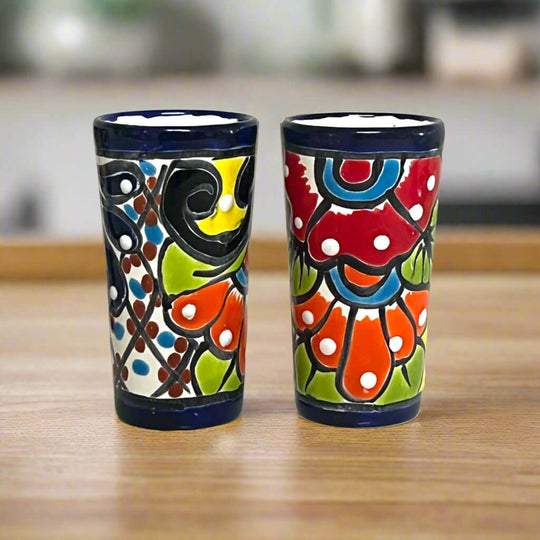 Blue Rim Talavera Shot Glass | Hand-Painted Mexican Drinkware - pair of hand-painted tall Talavera shot glasses with blue rims and colorful floral motifs