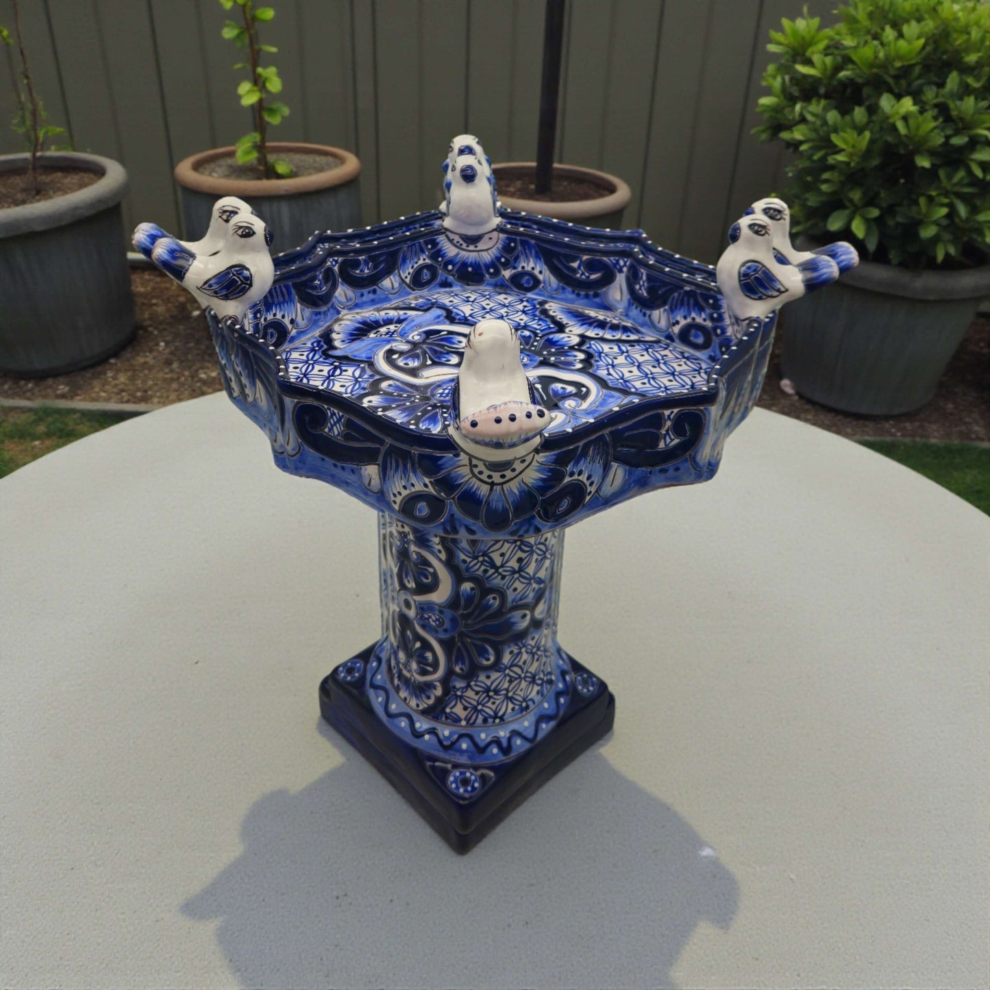 Colorful Talavera Bird Bath | Hand-Painted Ceramic Garden Art - hand-painted blue Talavera bird bath with perched ceramic birds, floral motifs, handcrafted in Guanajuato