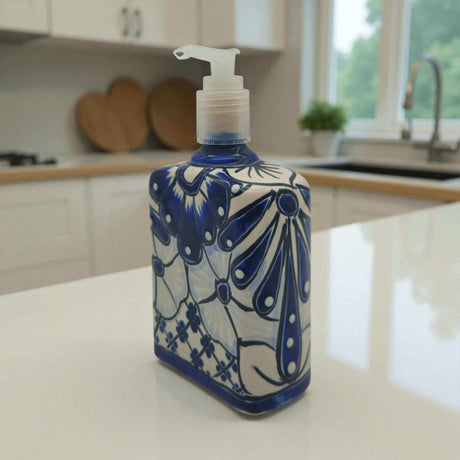 Hand-Painted Blue Talavera Soap Dispenser | Floral Ceramic Decor - hand-painted cobalt blue floral ceramic soap dispenser on white countertop