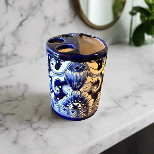 Hand-Painted Talavera Toothbrush Holder | Blue & White Ceramic on marble bathroom counter, hand-painted cobalt floral design