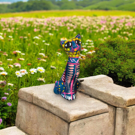 Hand-Painted Guerrero Cat Statue | Colorful Mexican Ceramic Figure (Medium) hand-painted Guerrero cat on stone wall in flower field