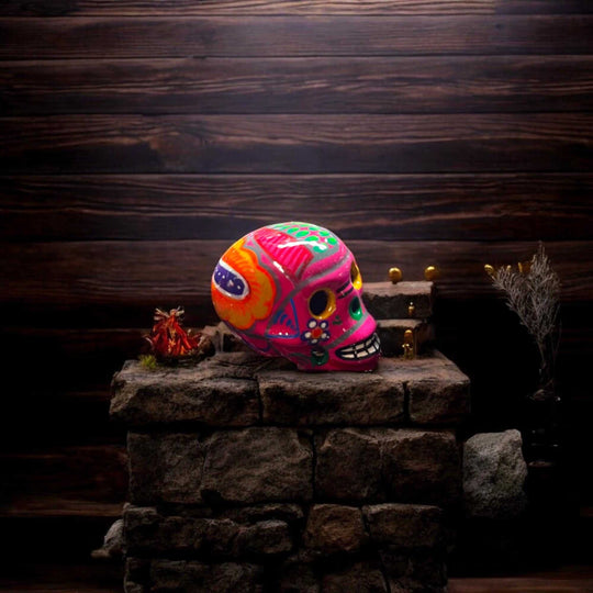 Hand-Painted Guerrero Skull | Colorful Mexican Artisan Statue - vibrant hand-painted Guerrero pottery skull on rustic stone display