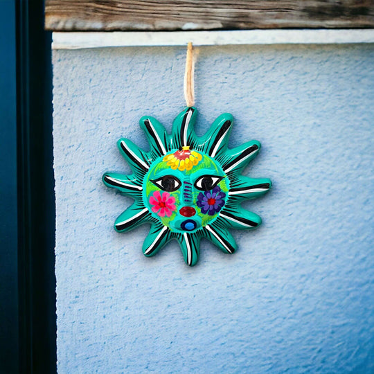 Hand-Painted Guerrero Sun Wall Art | Mexican Folk Decor - hand-painted green sun face with floral details, kiln-fired Talavera-style wall hanging