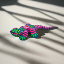 Vibrant Guerrero Gecko Figurine | Hand-Painted Mexican Folk Art - hand-painted pink and green striped clay gecko with floral back, lead-free glazed folk art