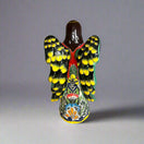 Talavera Angel Statue | Hand-Painted Mexican Ceramic Figurine showing hand-painted floral and geometric patterns in vivid yellow red green blue
