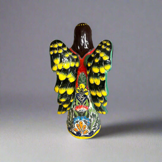 Talavera Angel Statue | Hand-Painted Mexican Ceramic Figurine showing hand-painted floral and geometric patterns in vivid yellow red green blue